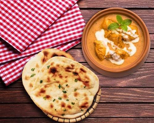 Order Creamy Butter Chicken & Naan Bread  food online from Bowl-O-India store, San Francisco on bringmethat.com