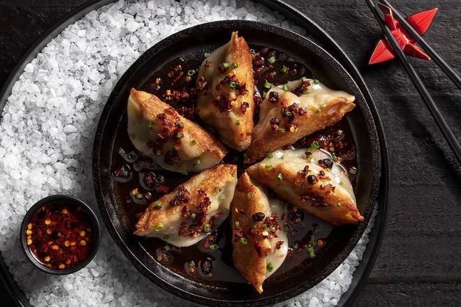 Order Handmade Pork Dumplings | 6 Count food online from P.F. Chang's China Bistro store, Annapolis on bringmethat.com