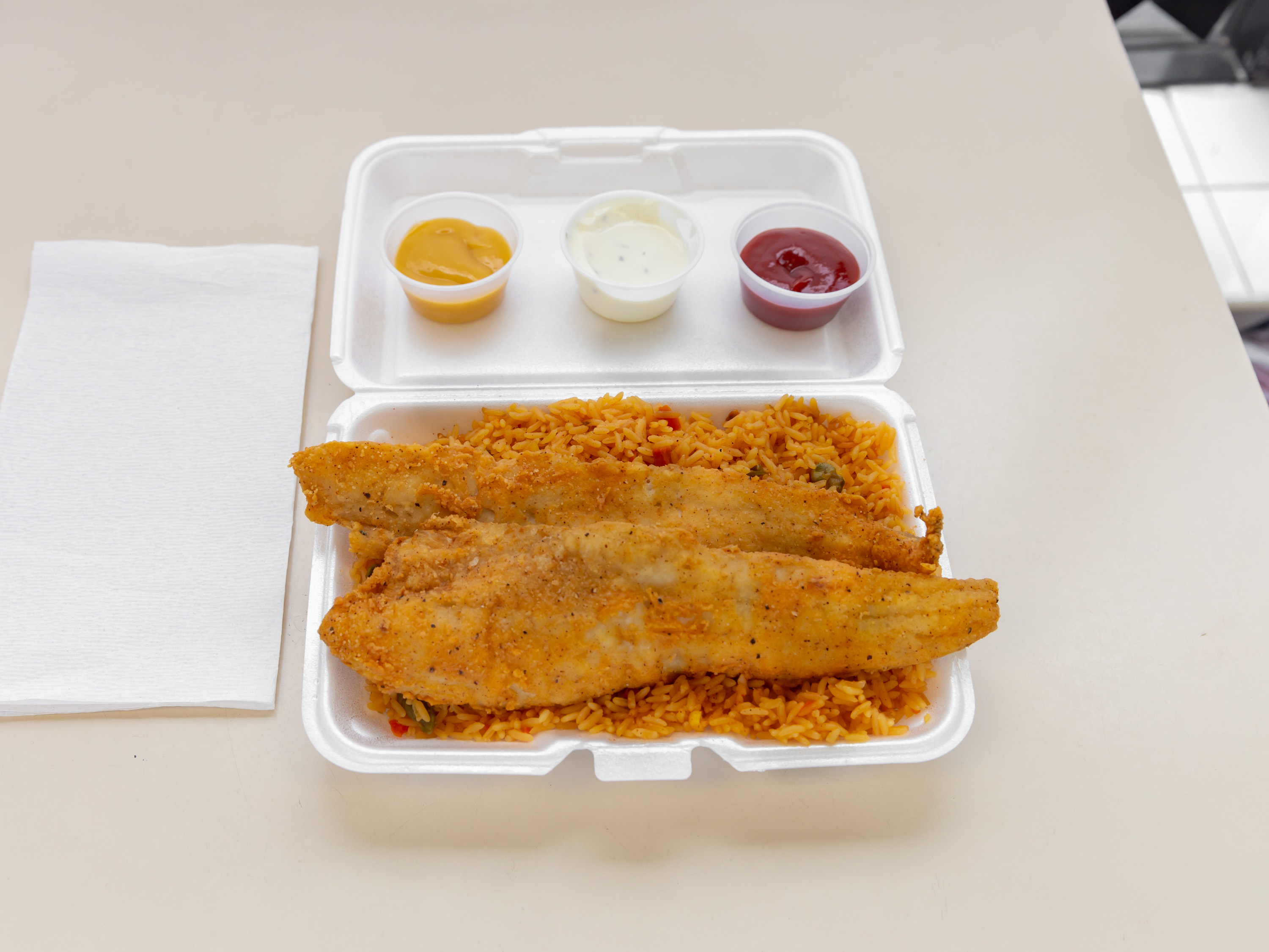 Order 2 Piece Fish with rice And soda food online from Crown Fried Chicken store, Providence on bringmethat.com