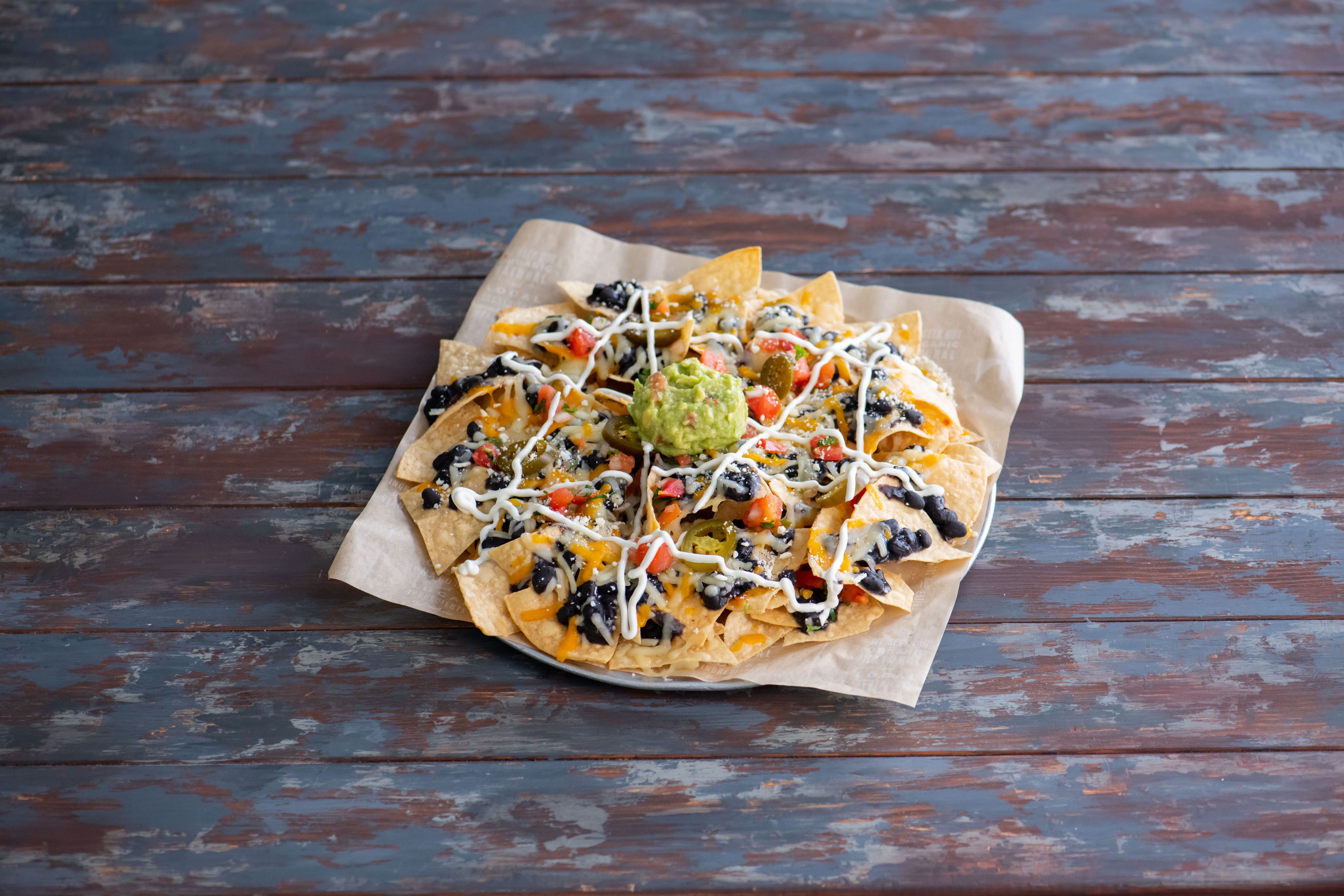 Order Nachos food online from Sharky Woodfired Mexican Grill store, Beverley Hills on bringmethat.com