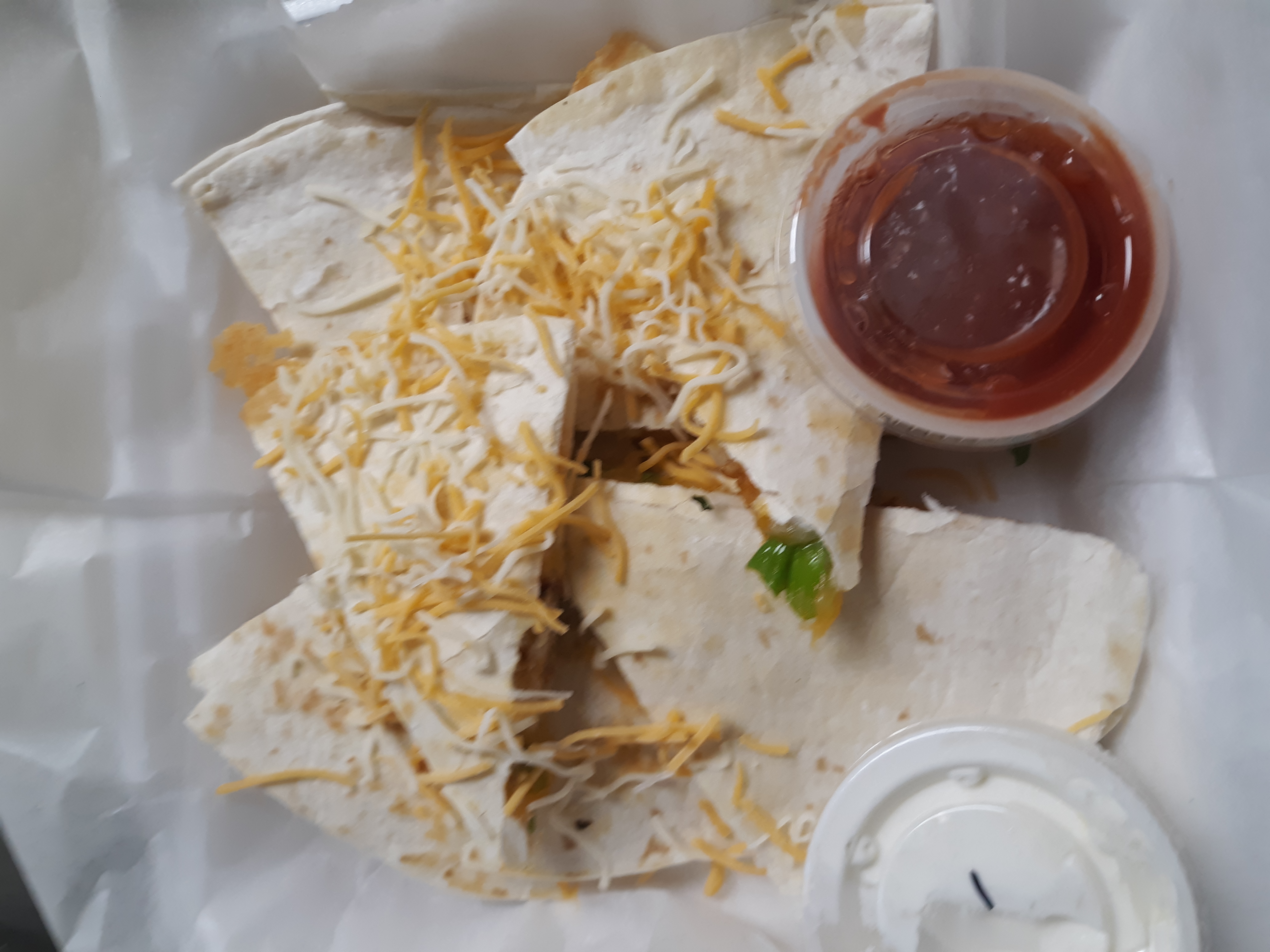 Order Chicken Quesadilla food online from Boozie Bar & Grille store, Davenport on bringmethat.com