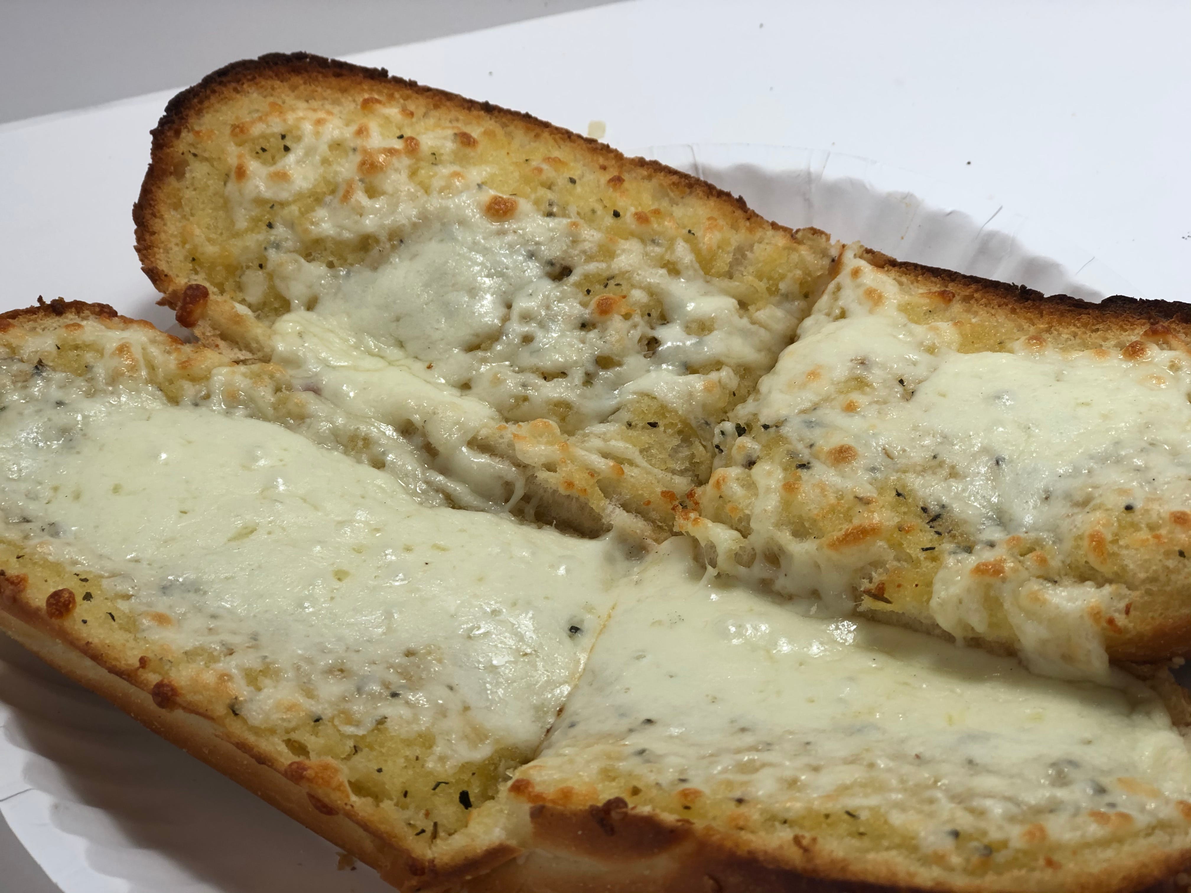 Order Garlic Bread with Cheese - Side food online from Lombardo Pizza store, Wyoming on bringmethat.com