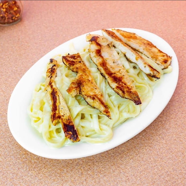 Order Fettuccine with Alfredo Sauce & Grilled Chicken - Pasta food online from I Love NY Pizza store, Yonkers on bringmethat.com