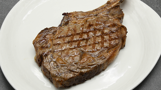 Order Prime Cowboy Ribeye 22 oz food online from Mitchell's Steakhouse store, Columbus on bringmethat.com