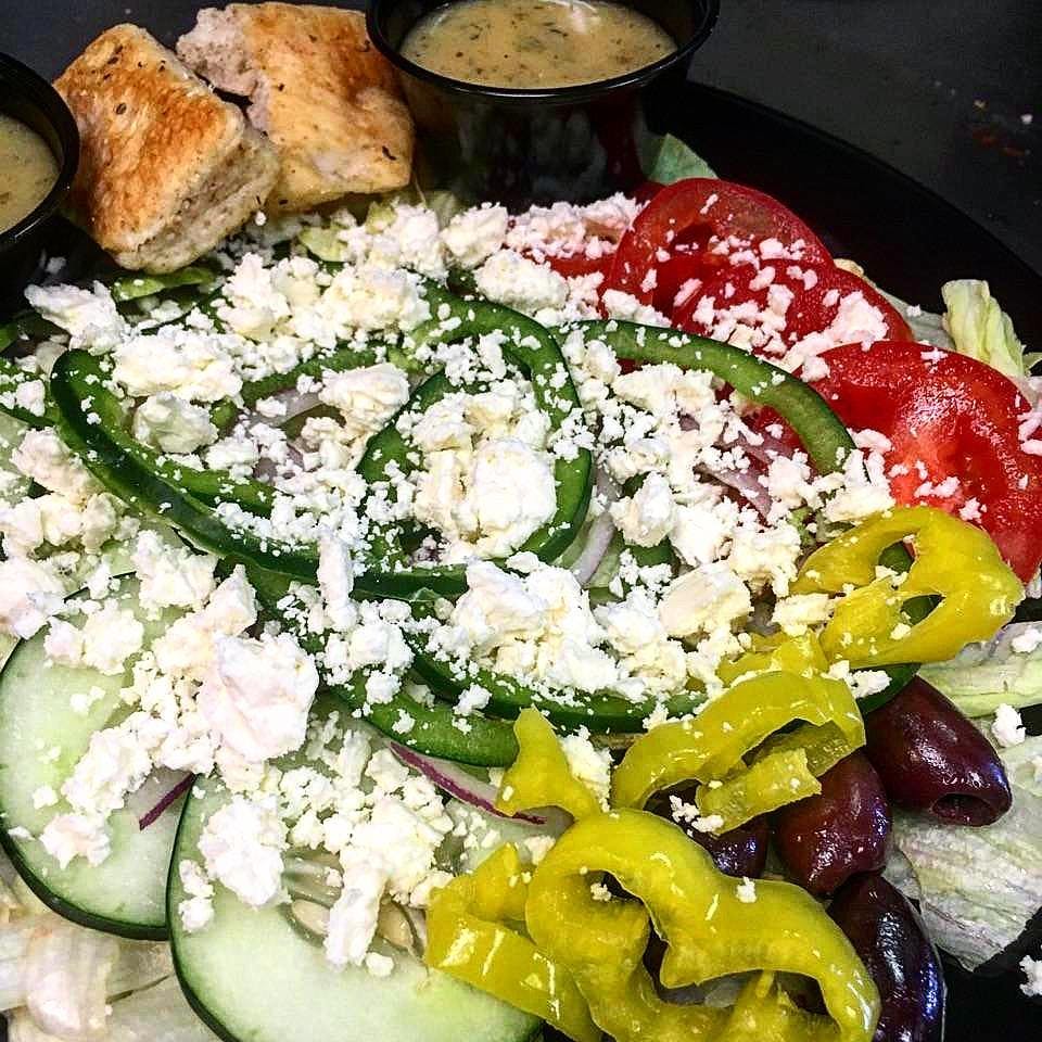 Order Greek Salad - Regular food online from Holiday Pizza store, Statesboro on bringmethat.com