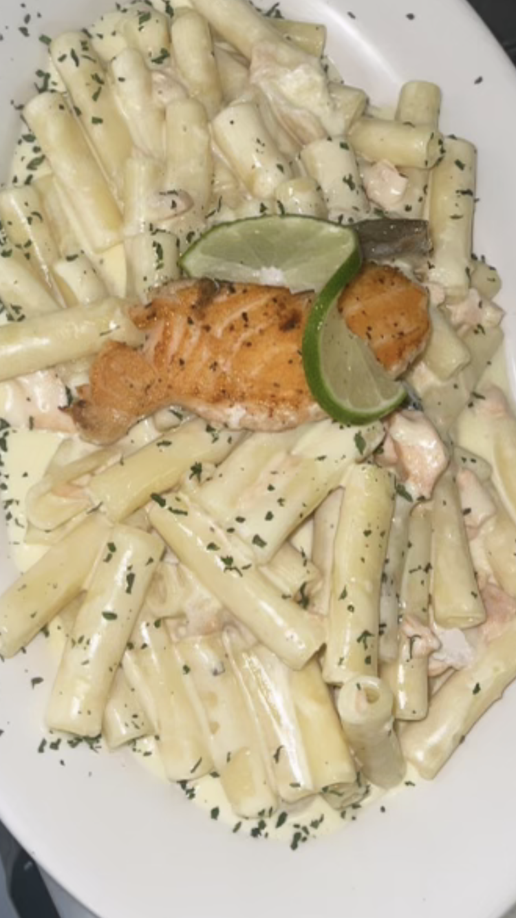 Order Grill Salmon w Alfredo sauce  food online from Johnny's Pizza Diner store, Bronx on bringmethat.com