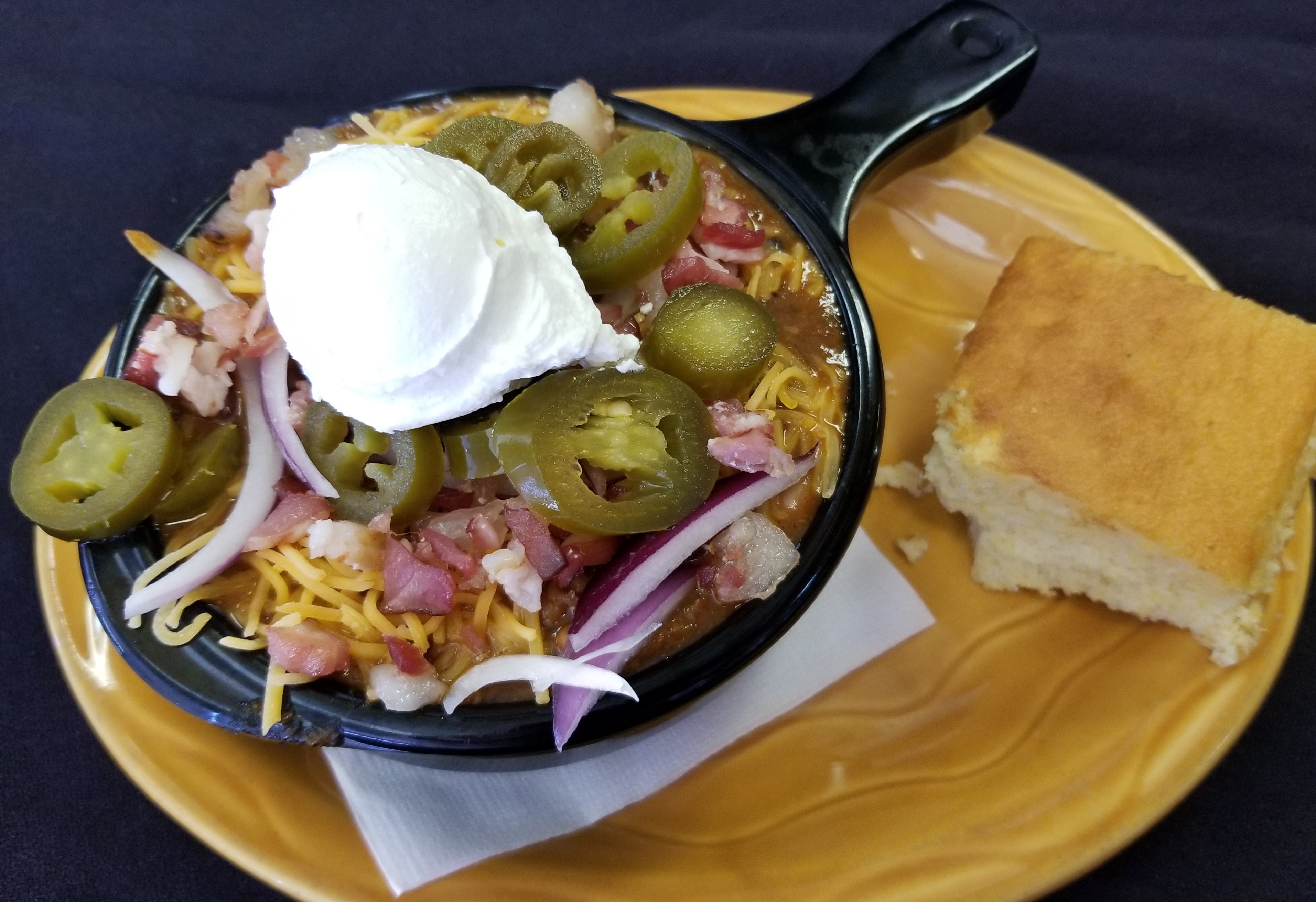 Order LOADED CHILI BOWL (contains meat) food online from Kloby's Smokehouse store, Laurel on bringmethat.com