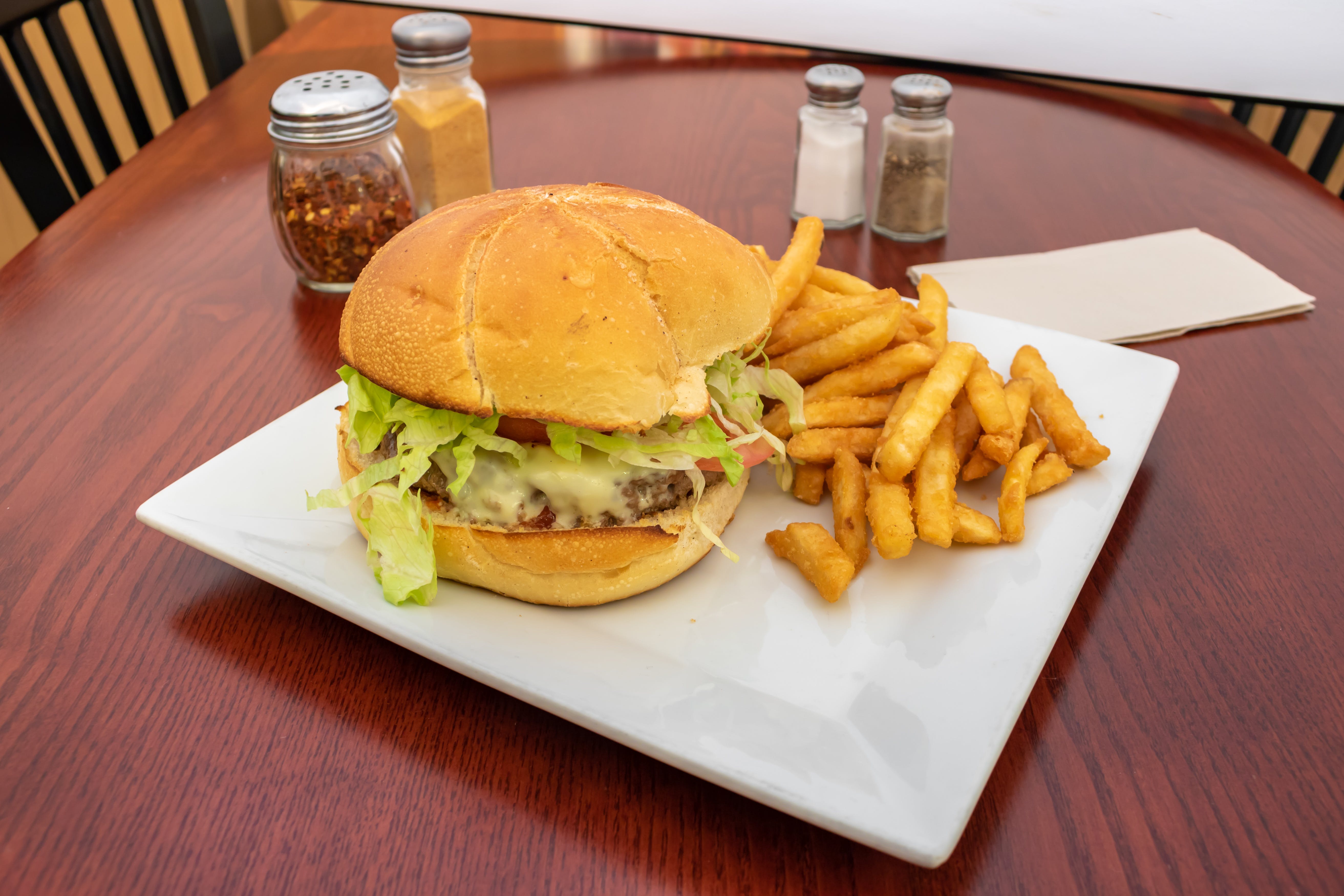 Order Cheeseburger Deluxe - Burger food online from Brothers Pizza store, Princeton Junction on bringmethat.com