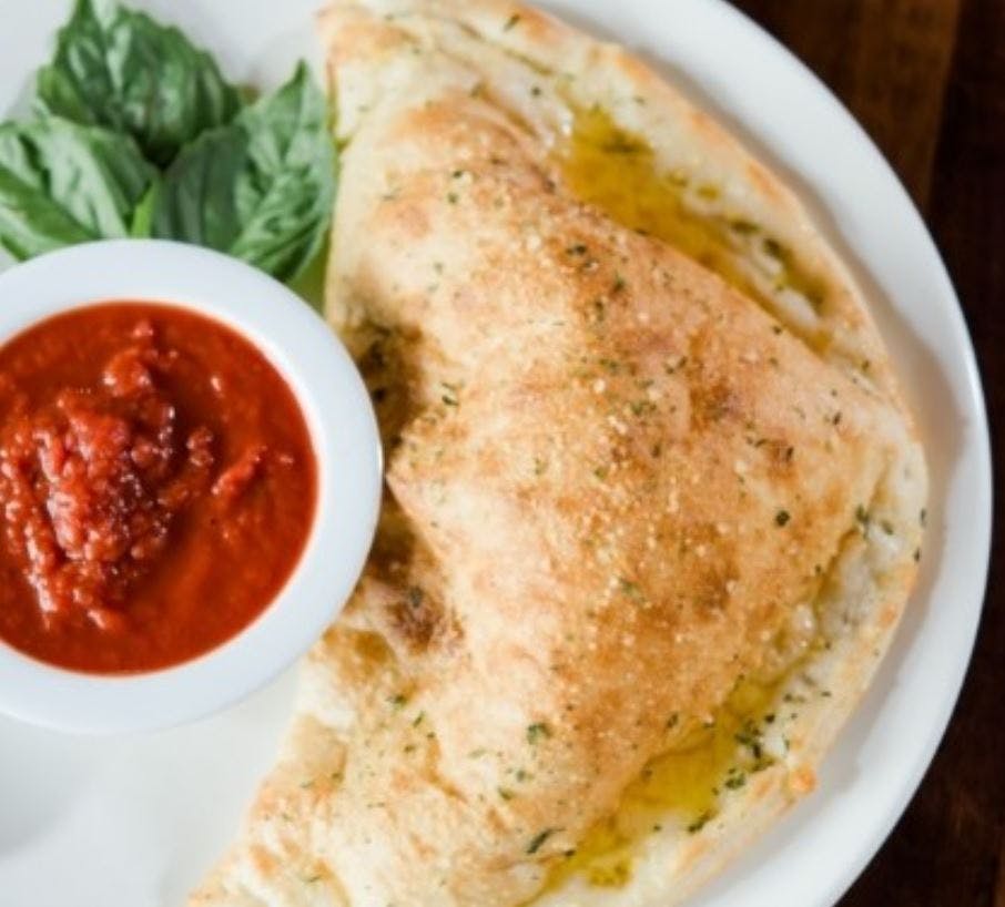 Order Cheese Calzone - Calzone food online from Jonny Pizza store, Fort Worth on bringmethat.com