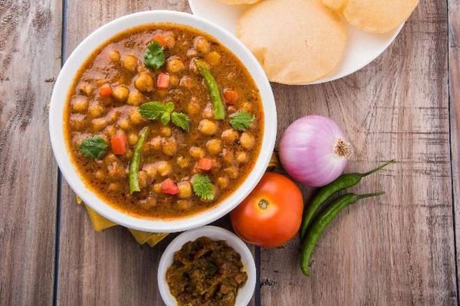 Order Channa Masala food online from 8 elements perfect cuisine store, San Jose on bringmethat.com