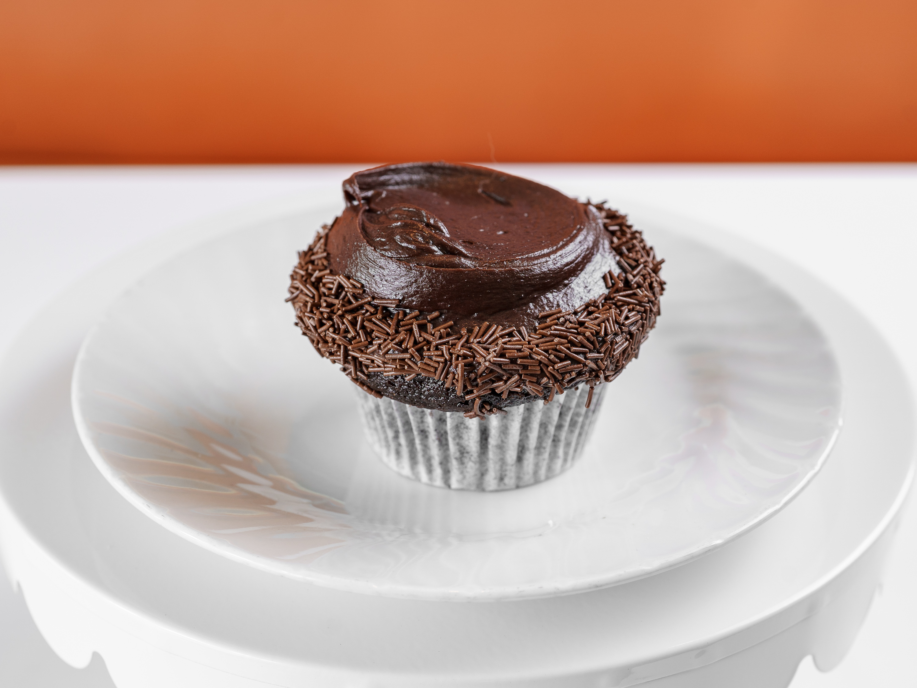 Order Chocolate / Chocolate Buttercream Cupcake food online from Frosted Cupcakery store, Long Beach on bringmethat.com