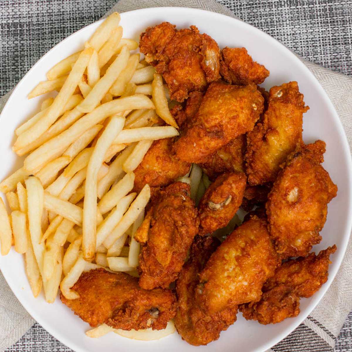 Order #14. Hot Wings Combo food online from Crown Fried Chicken store, Newark on bringmethat.com