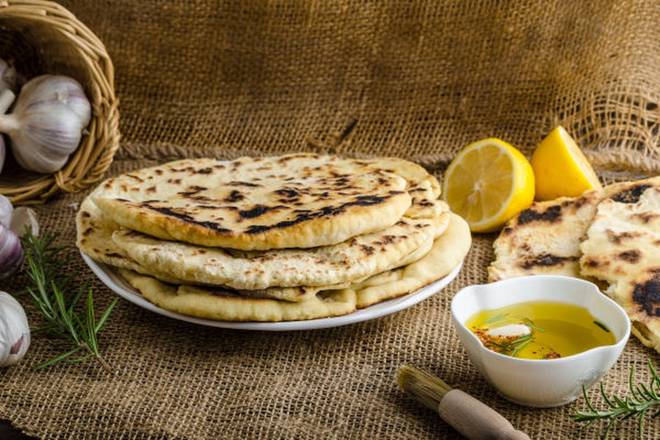 Order Butter Naan food online from Bowl O Biryani store, Downers Grove on bringmethat.com