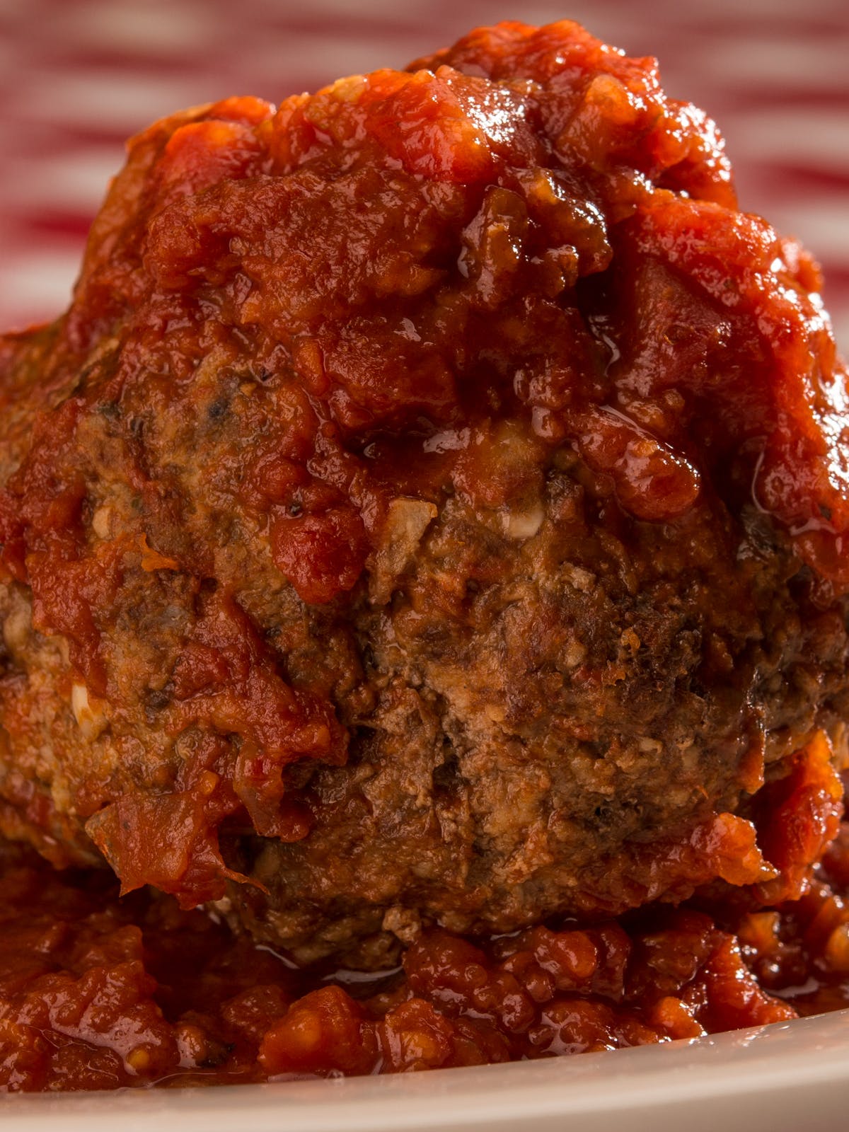 Order Half Pound Meatball - 1 Piece food online from Buca di Beppo store, Norwood on bringmethat.com