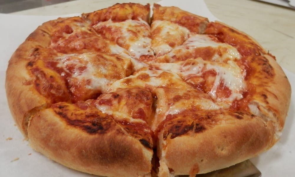 Order Cheese Pizza - 10'' food online from Hugo's Pizza store, Ashland on bringmethat.com