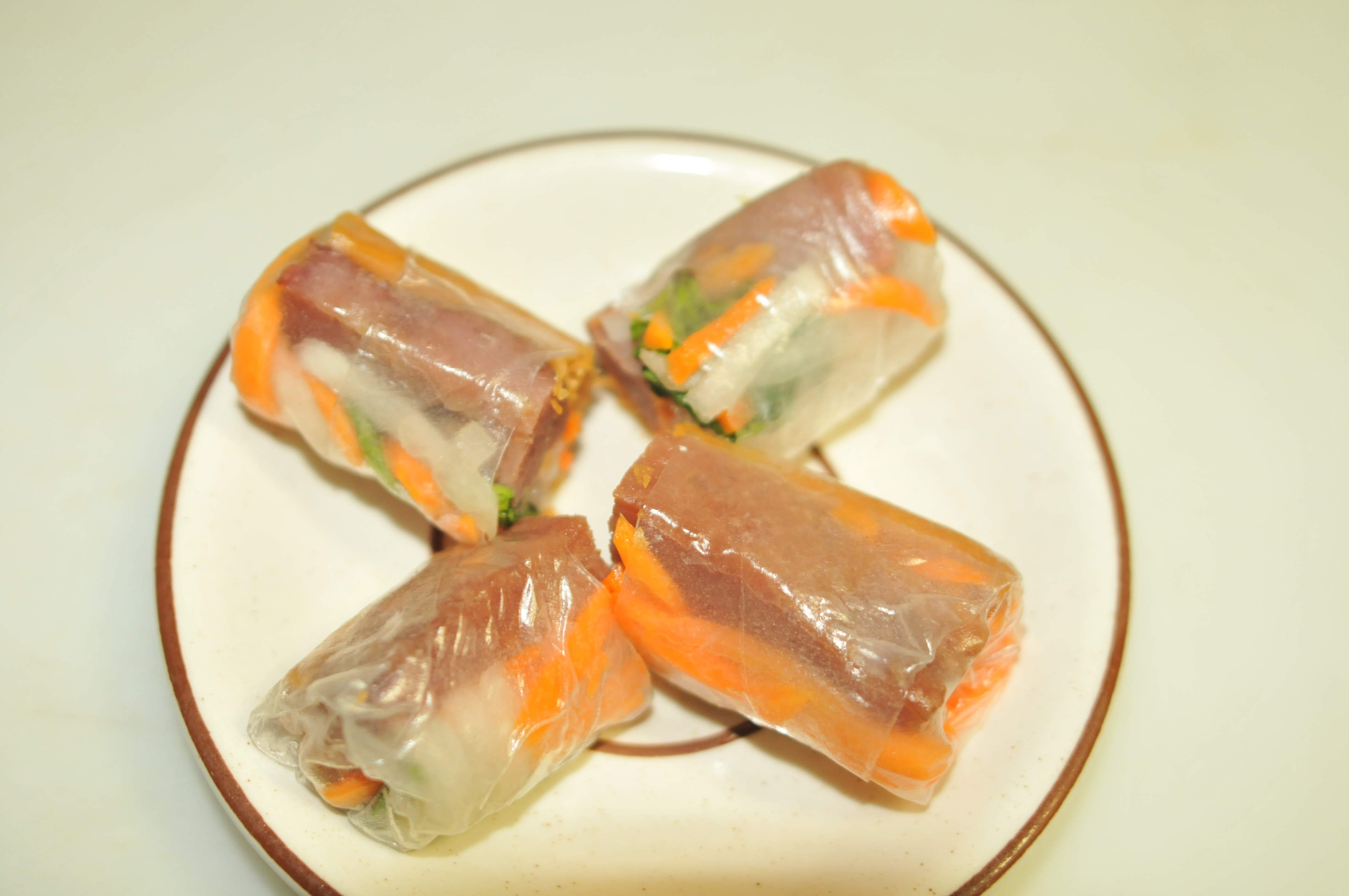 Order 4. Goi Cuon Nem Nuong/Pork meatball spring rolls food online from Pho Bistro store, Malden on bringmethat.com
