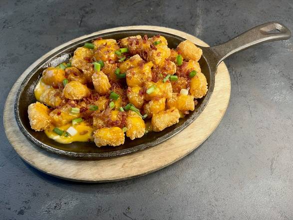 Order Loaded Tots™ food online from East Coast Wings + Grill store, Indian Trail on bringmethat.com