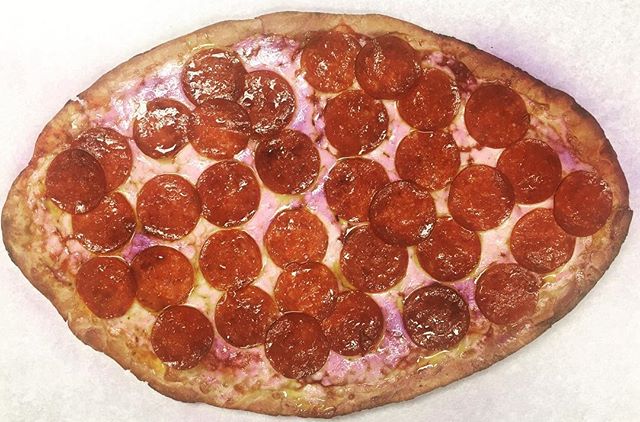 Order 12" Large Purple Football Pizza food online from The Beef Brothers Deli & Catering store, Ellicott City on bringmethat.com