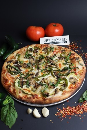 Order Veggie Lovers Pizza food online from The Brickyard store, Woburn on bringmethat.com