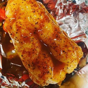 Order Cajun Buttered Lobster Tail food online from Trap Fusion store, Cordova on bringmethat.com