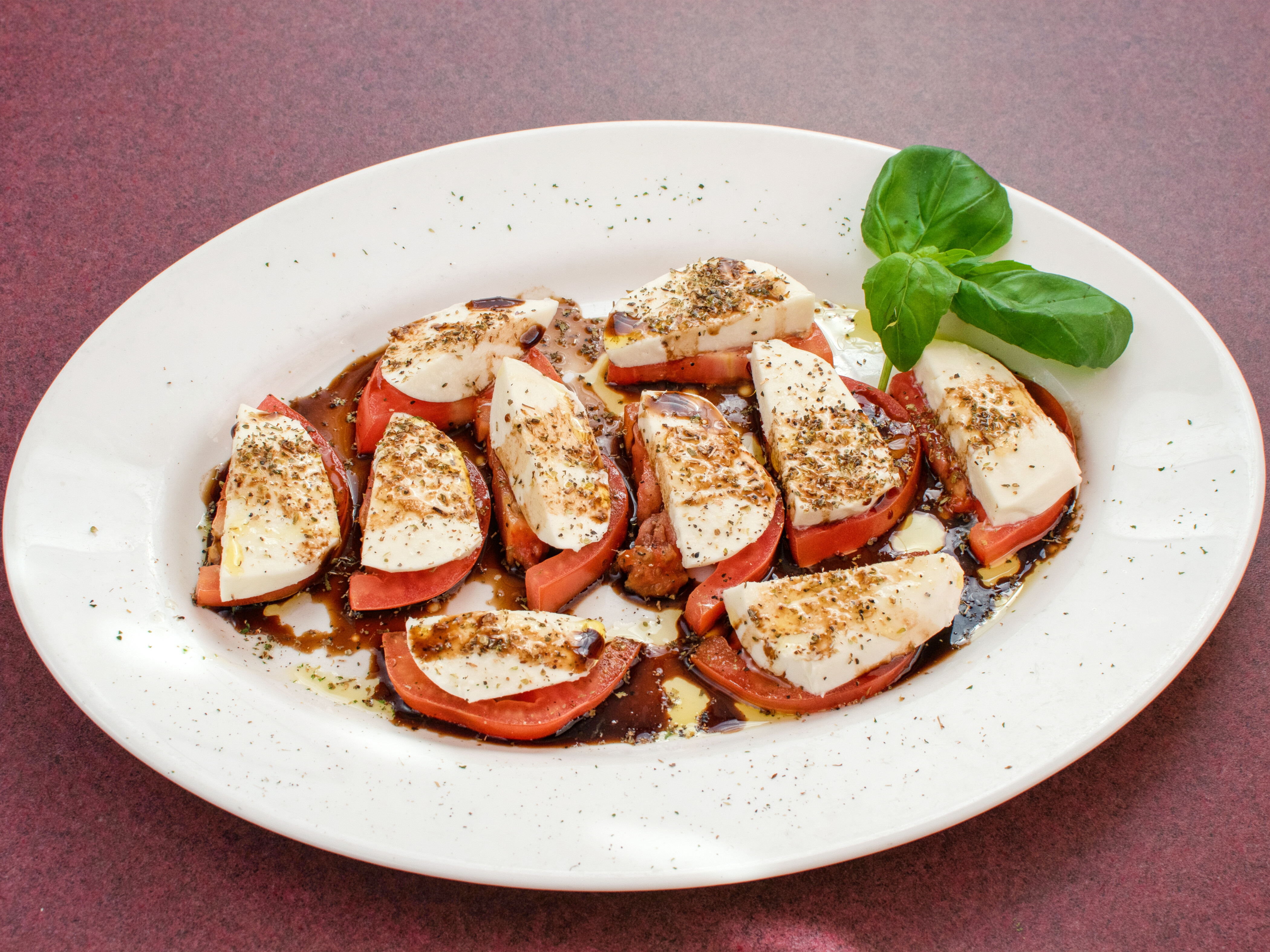 Order Caprese Salad food online from Alfredo's Mediterranean Grille and Steakhouse store, Charles Town on bringmethat.com