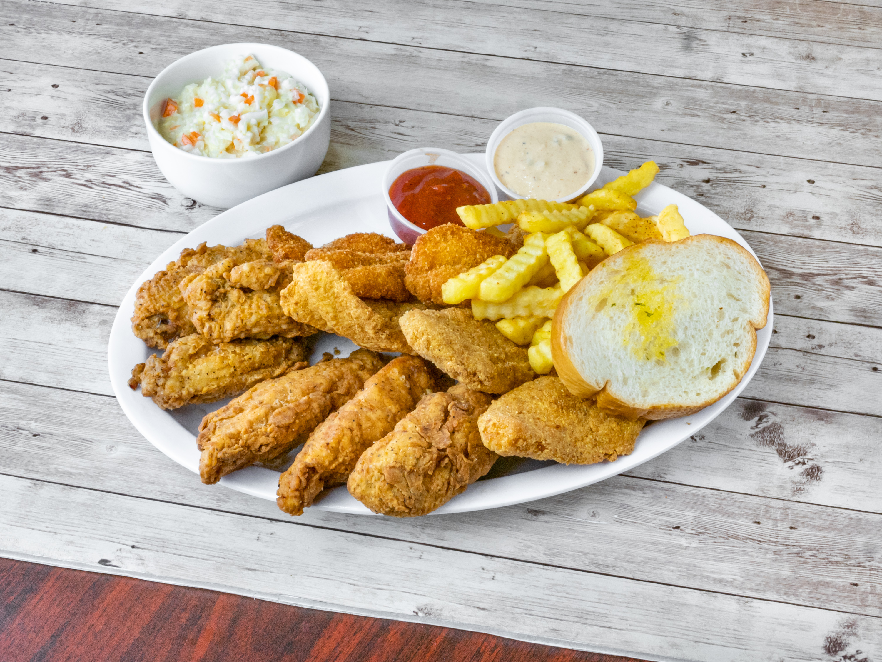 Order 12 Pieces Pick 4 Fried Platter food online from Fish Skillet Seafood store, Houston on bringmethat.com