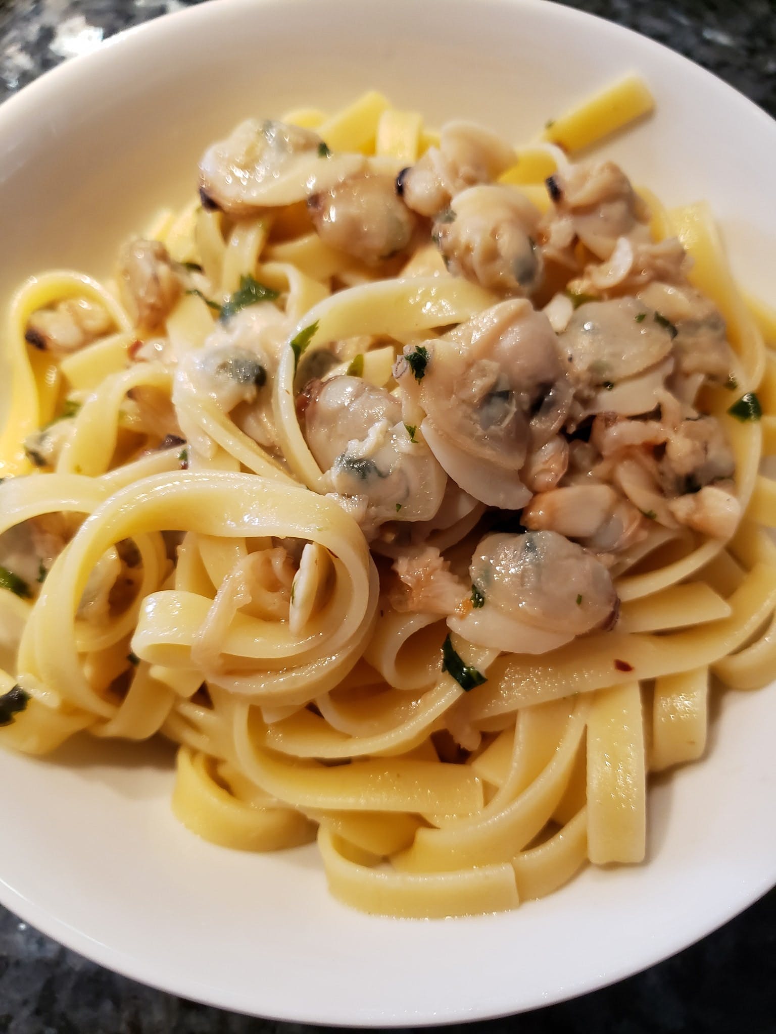 Order Linguine with Clam Sauce - Pasta food online from Emiliano's Pizza store, Poughkeepsie on bringmethat.com