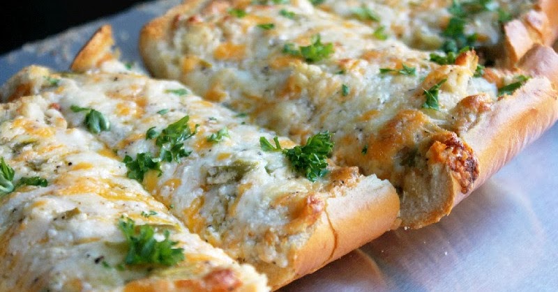 Order Garlic Bread with Cheese food online from Three Brothers Italian Restaurant store, Hyattsville on bringmethat.com