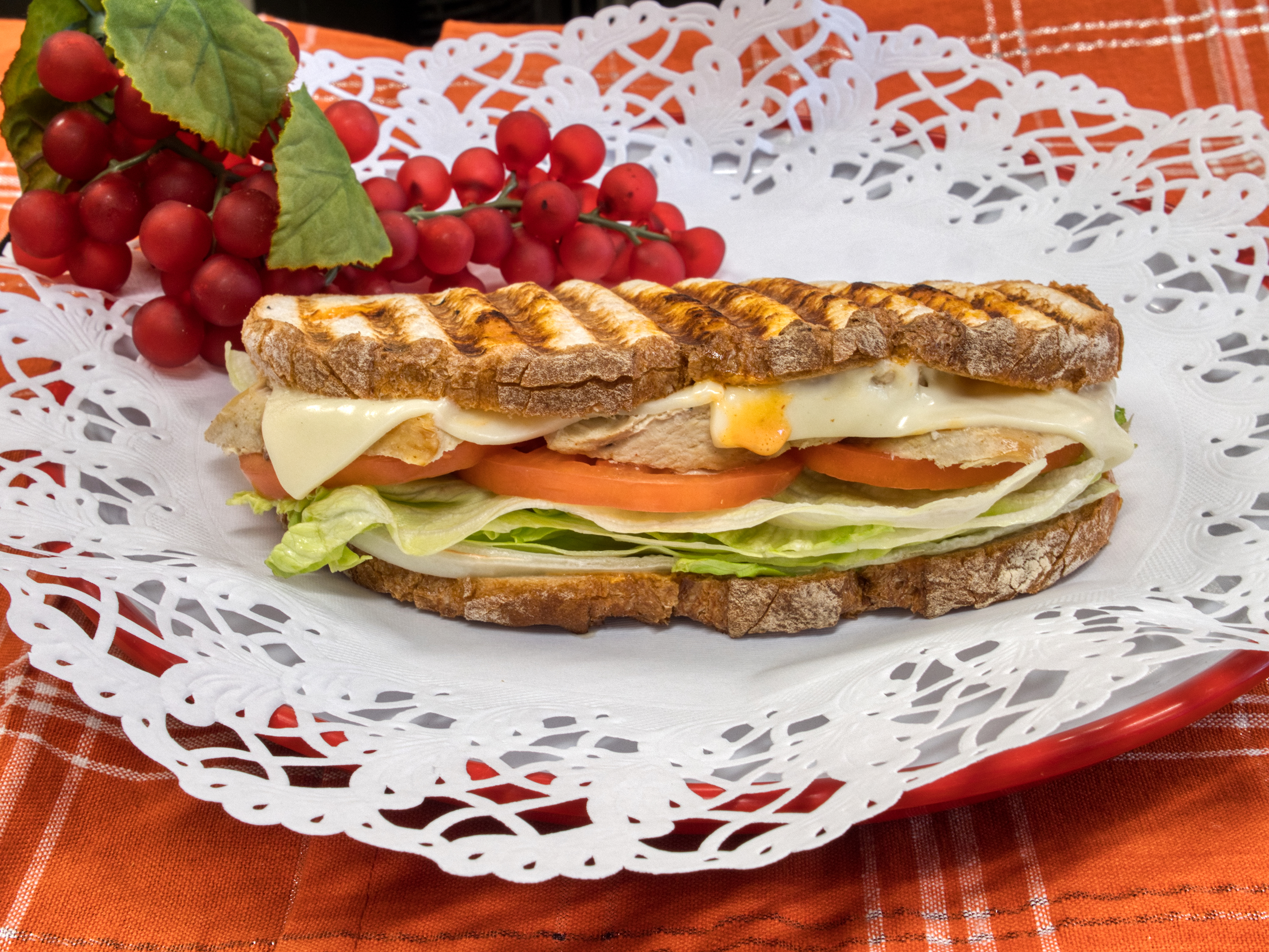 Order Chipotle Chicken Club Panini food online from Nicko Cafe & Deli store, Oakbrook Terrace on bringmethat.com