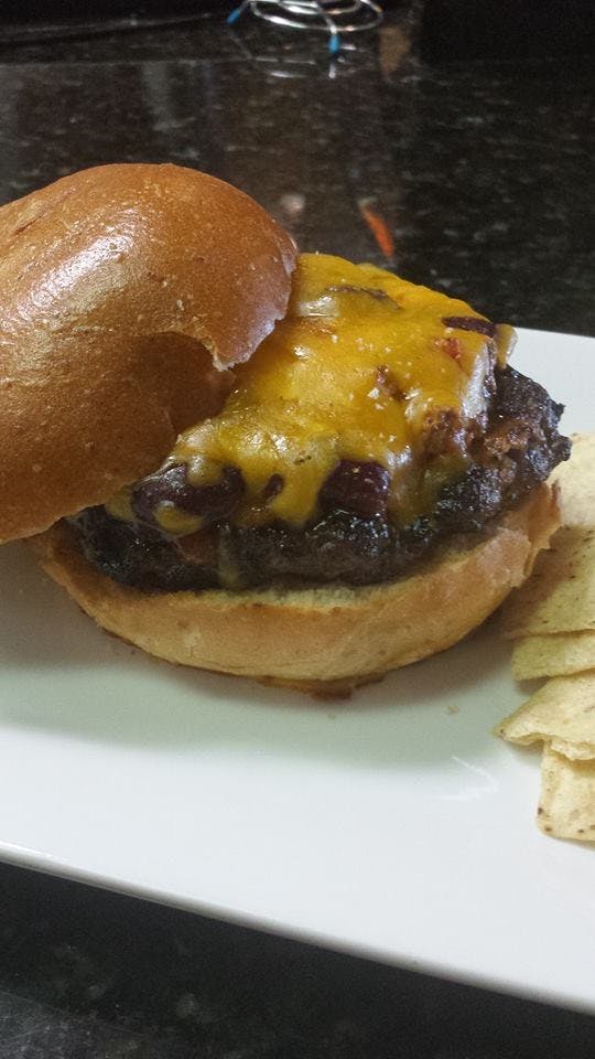 Order Cheeseburger - 1/2 lb. food online from Pizza Peddler store, West Chester on bringmethat.com