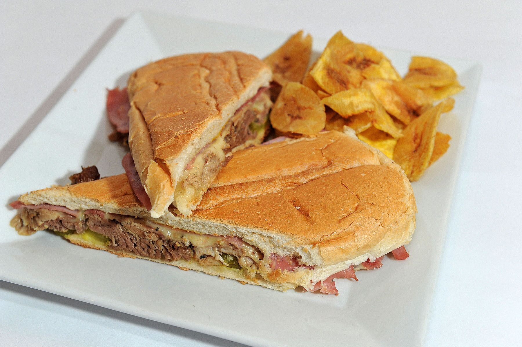 Order Cubano Sandwich  food online from Guantanamera restaurant store, New York on bringmethat.com