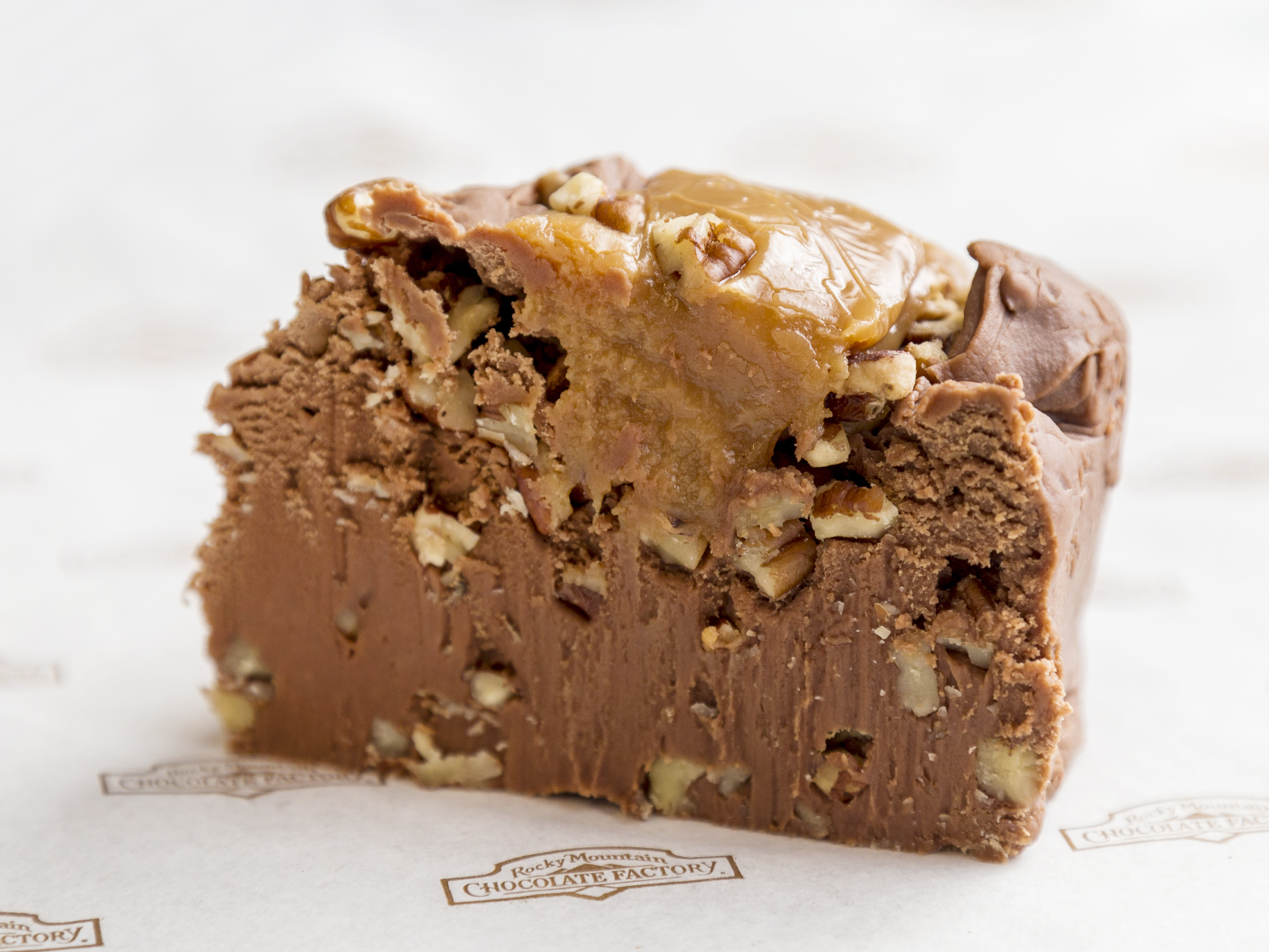 Order 1 lb. Caramel Pecan Fudge food online from Rocky Mountain Chocolate Factory store, Tempe on bringmethat.com