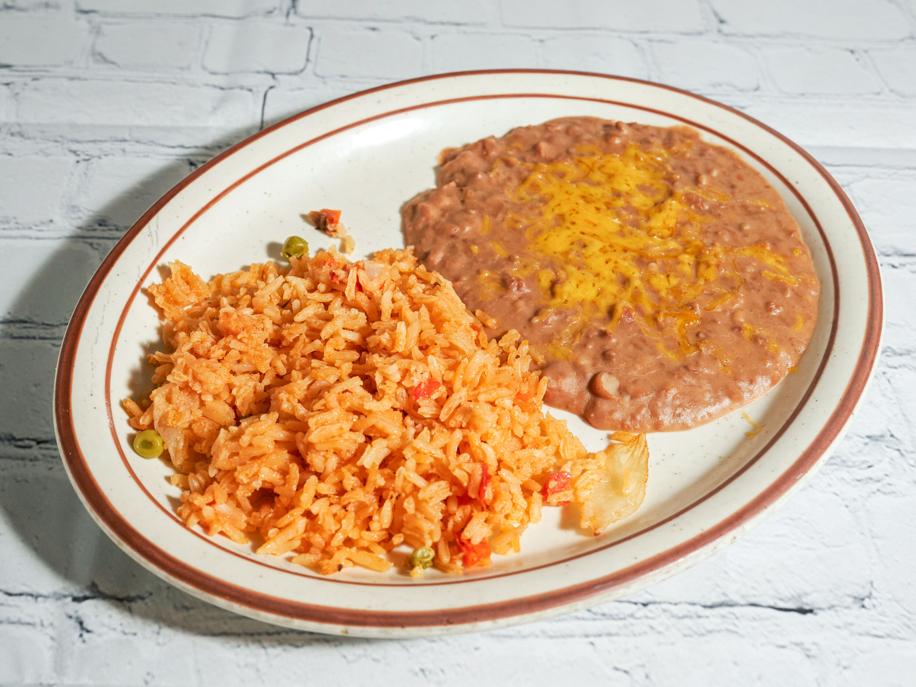 Order Rice and Beans food online from La Costa Restaurant store, Sandy on bringmethat.com