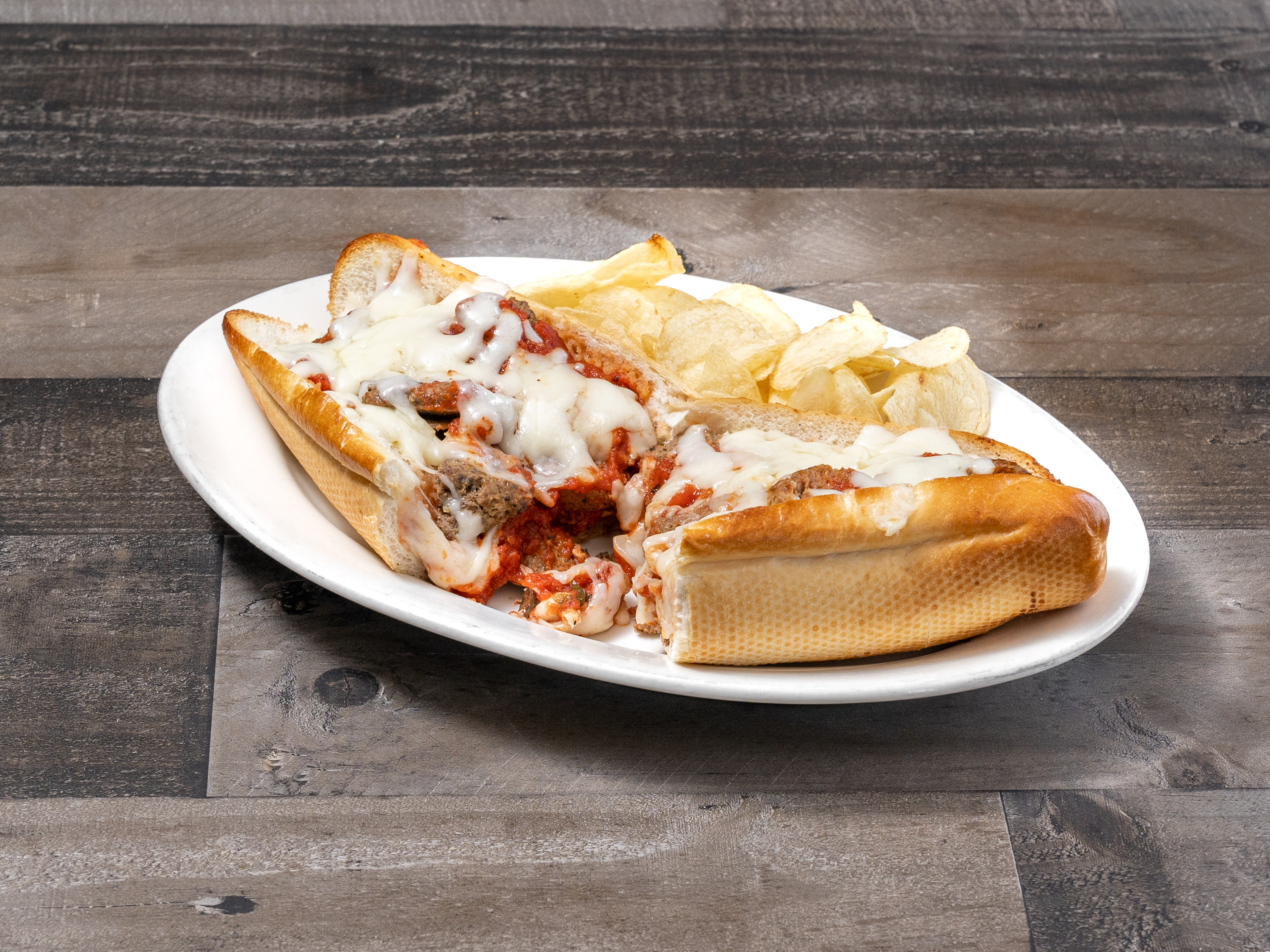 Order Meatball Parmigiana Sandwich food online from Sal's Pizza store, Dallas on bringmethat.com