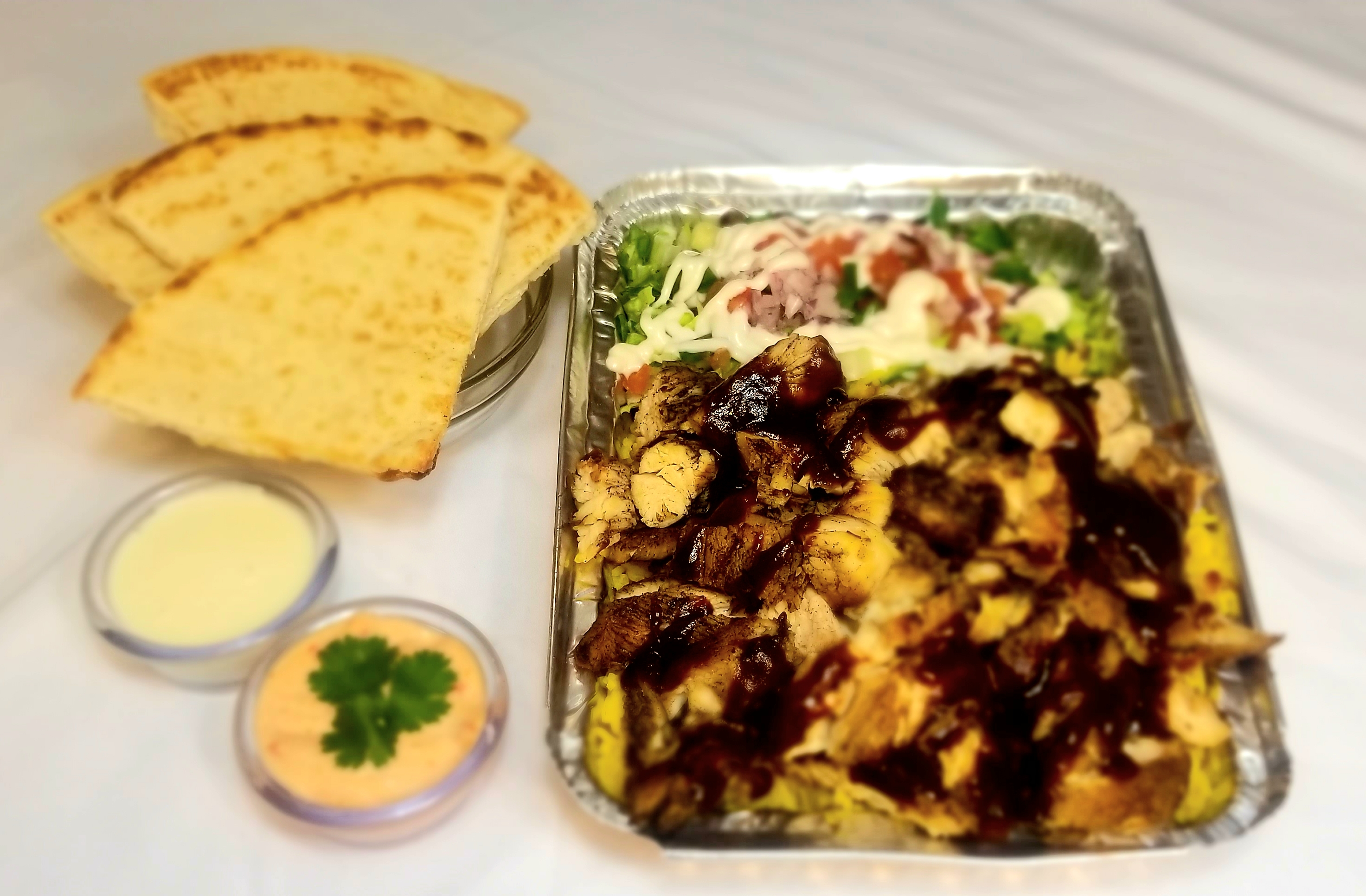Order Jerk Chicken Over Rice Platter Combo food online from Gyro Eats store, New York on bringmethat.com