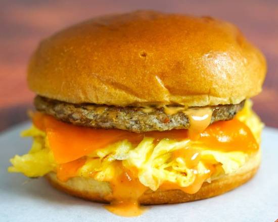 Order Sausage, Egg and Cheddar Breakfast Sandwich food online from Breakfast Club store, Fountain Valley on bringmethat.com
