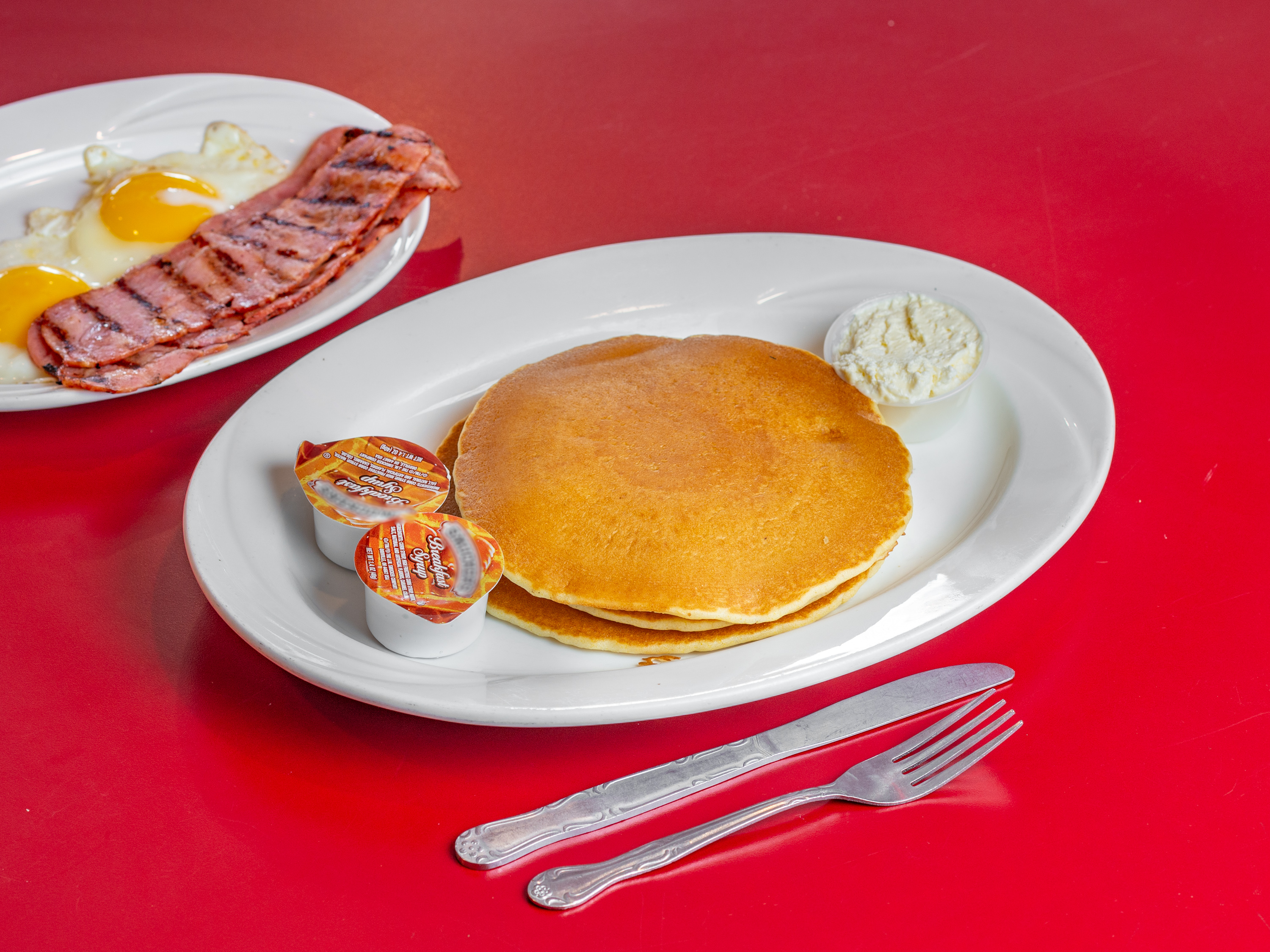 Order Golden Pancakes with Two Eggs food online from Morristown Diner store, Morristown on bringmethat.com
