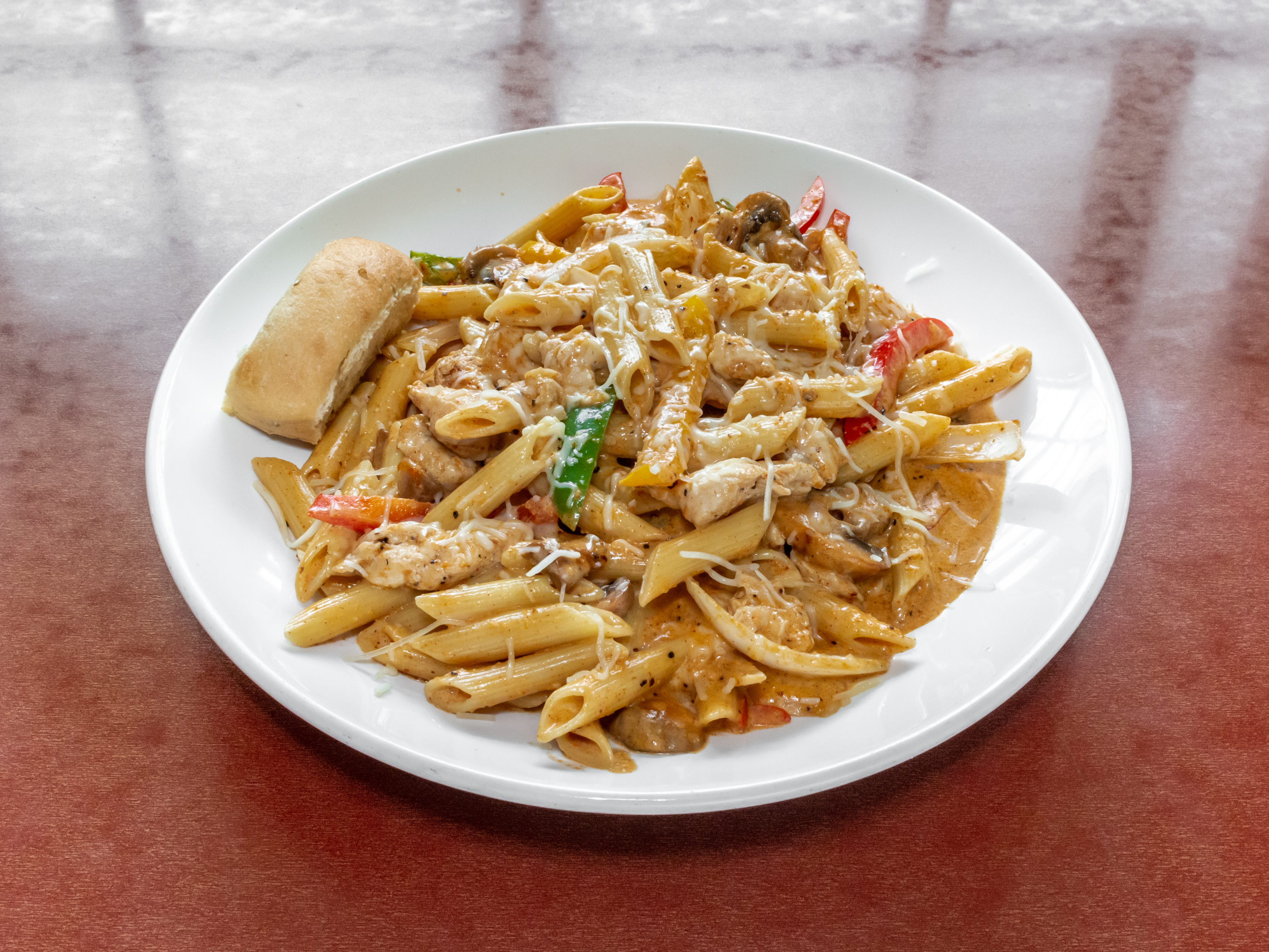 Order Louisiana Chicken Pasta food online from Stonewood Ale House store, Schaumburg on bringmethat.com