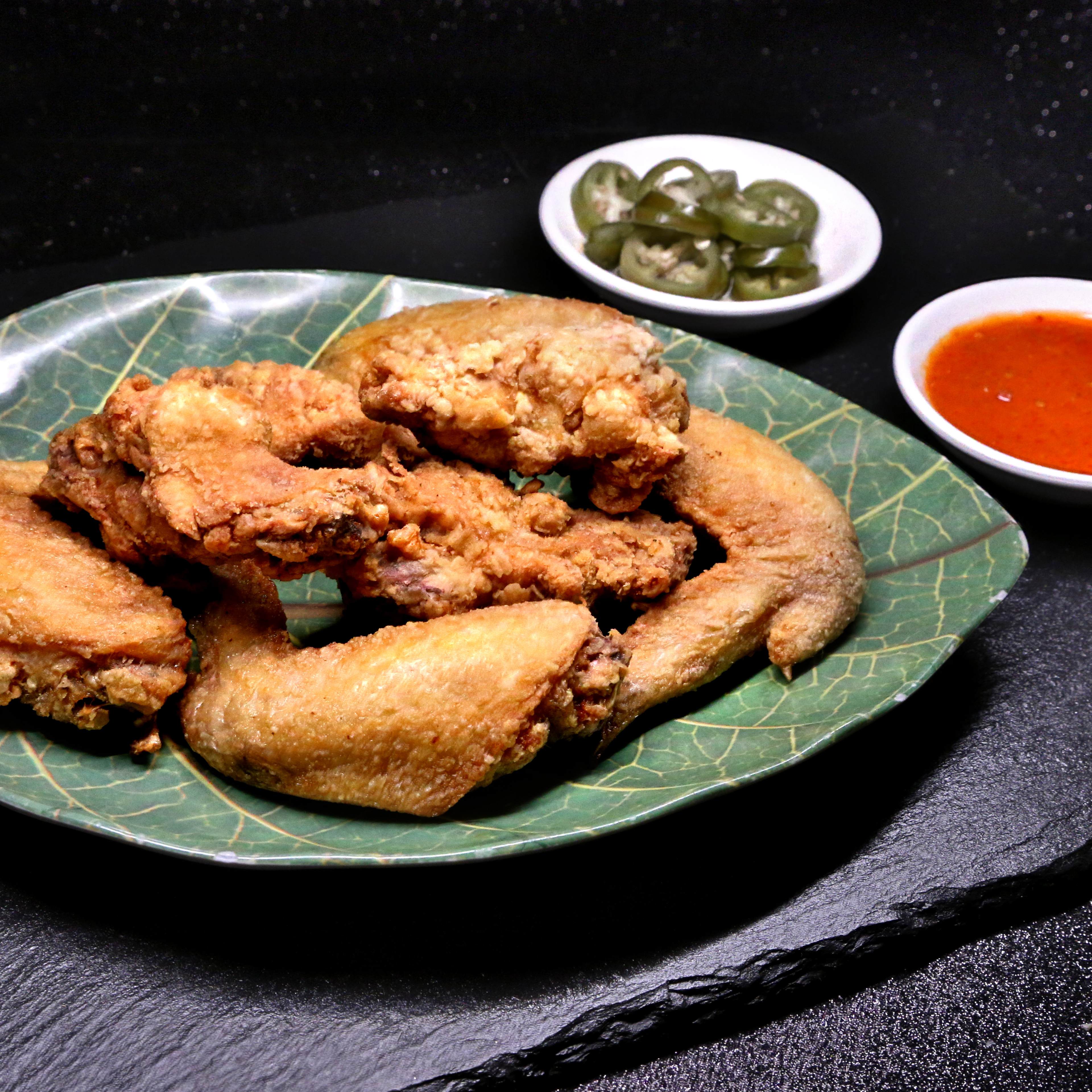 Order A8. Hot Pepper and Salt Deep Fried Chicken Wings food online from Singapore Cafe store, Sugar Land on bringmethat.com