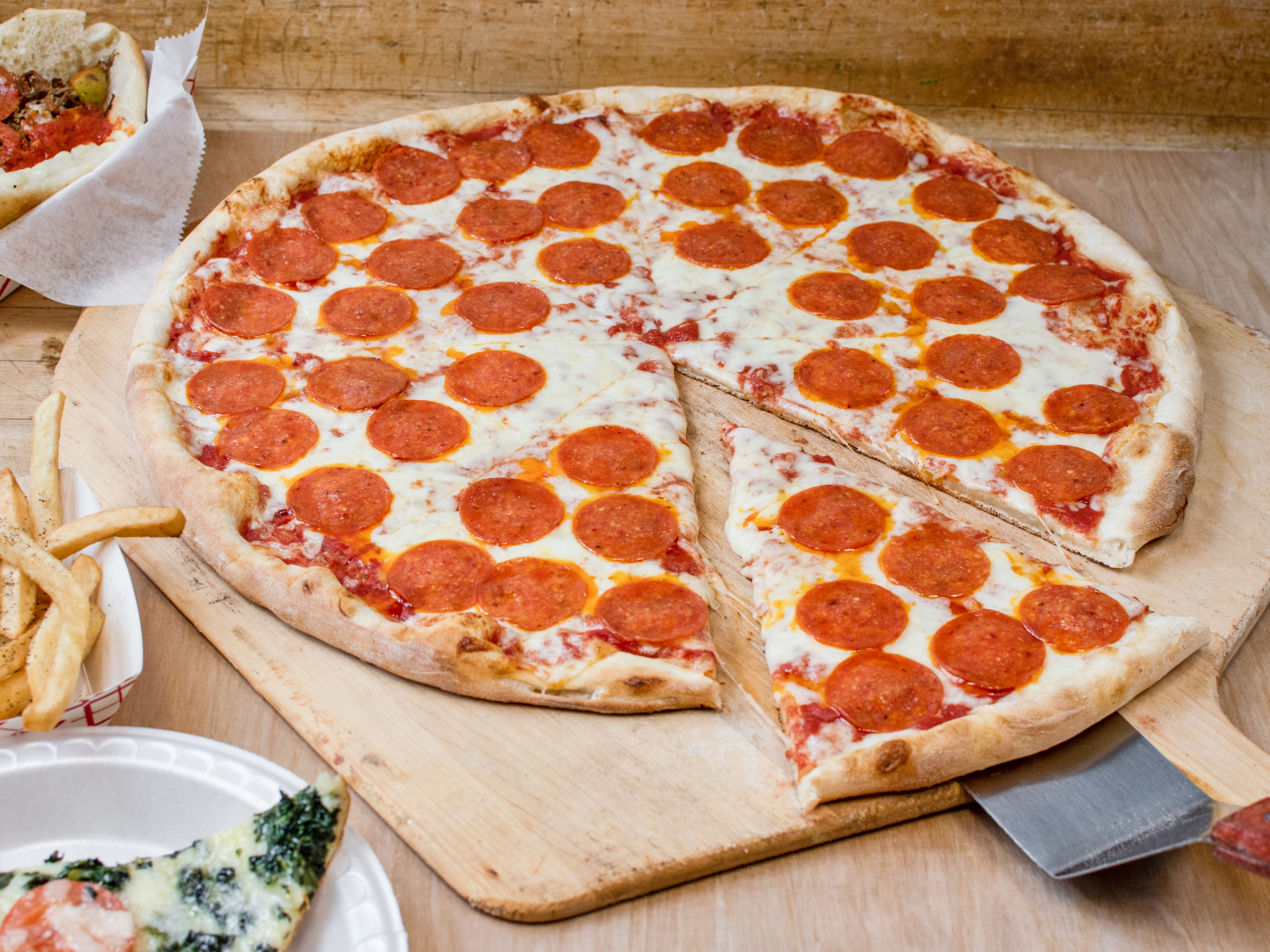 Order Pizza Supreme food online from Brothers Pizza store, Harrisburg on bringmethat.com