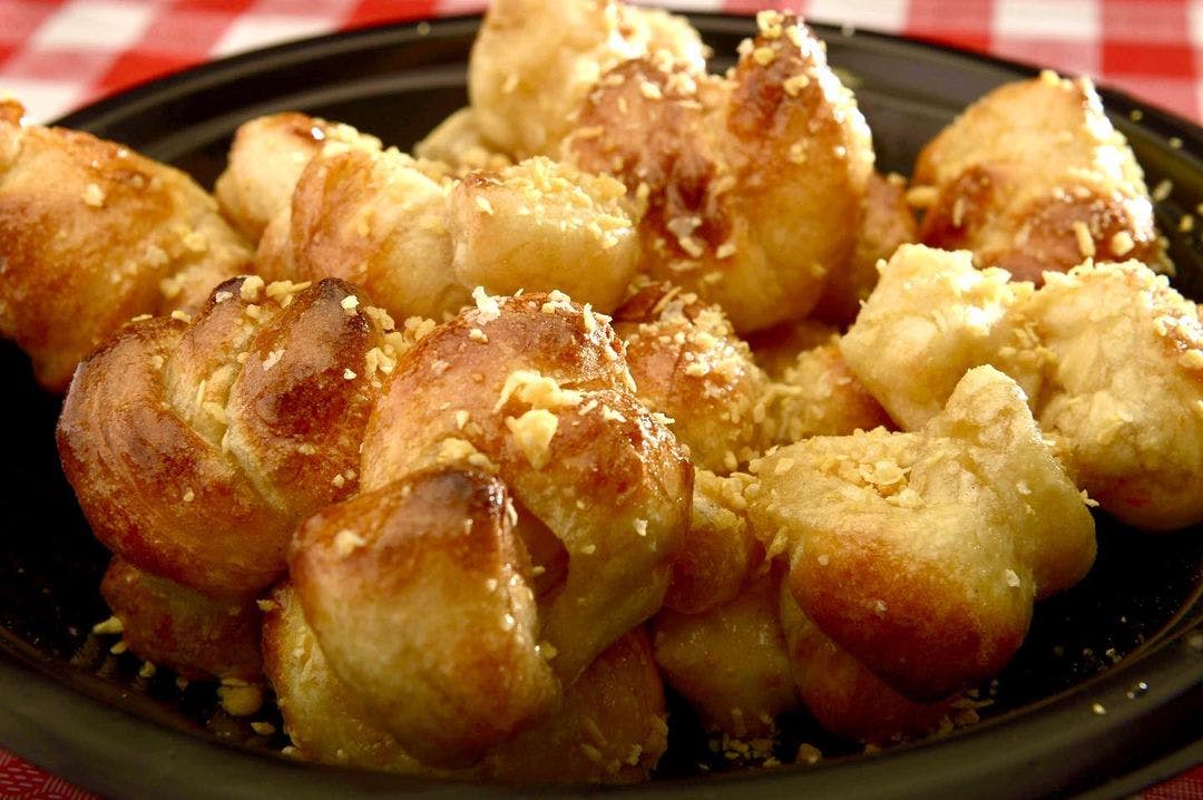 Order Almond Crunch Knots - Regular food online from Zito Pizza store, Orange on bringmethat.com