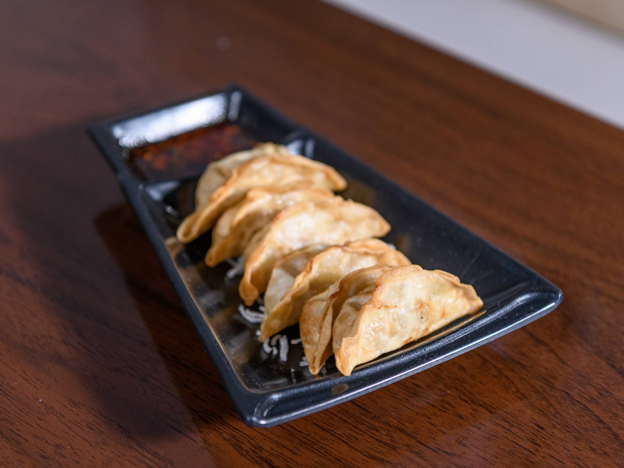 Order A11. Pot Stickers (6PCS) food online from Tea Cafe On The Corner store, Norman on bringmethat.com