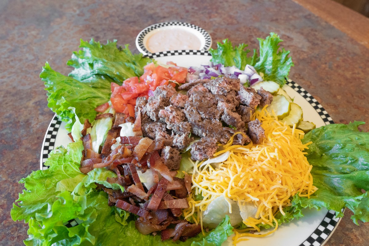 Order Bacon Cheeseburger Salad food online from Black Bear Diner store, Tulsa on bringmethat.com