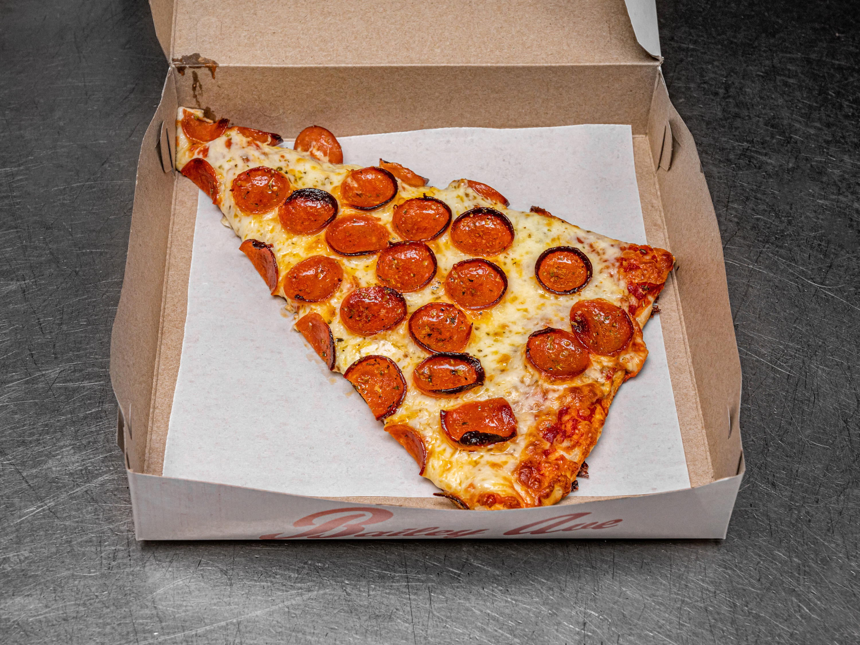 Order Cheese & Pepperoni Pizza By The Slice food online from Bailey Avenue Pizza store, Buffalo on bringmethat.com