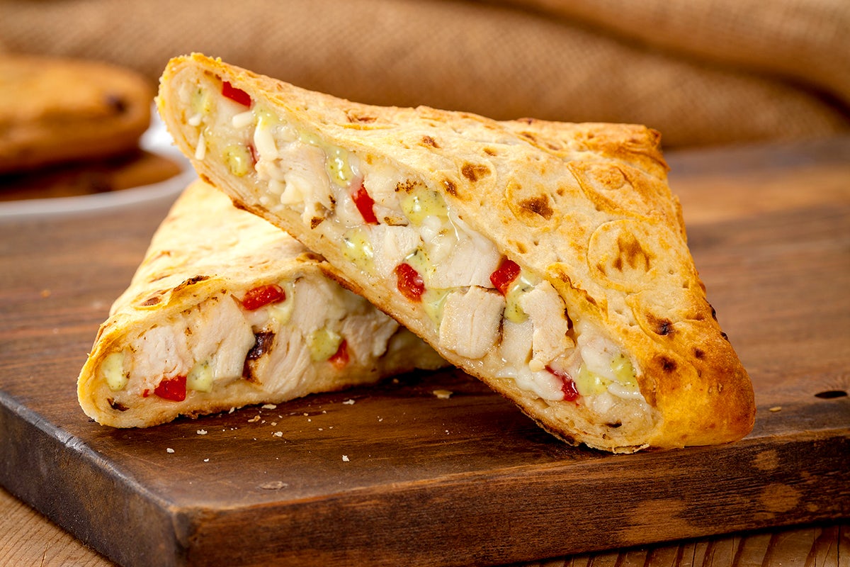 Order Chicken Pesto Panini food online from Nestle Toll House Cafe store, Fort Worth on bringmethat.com