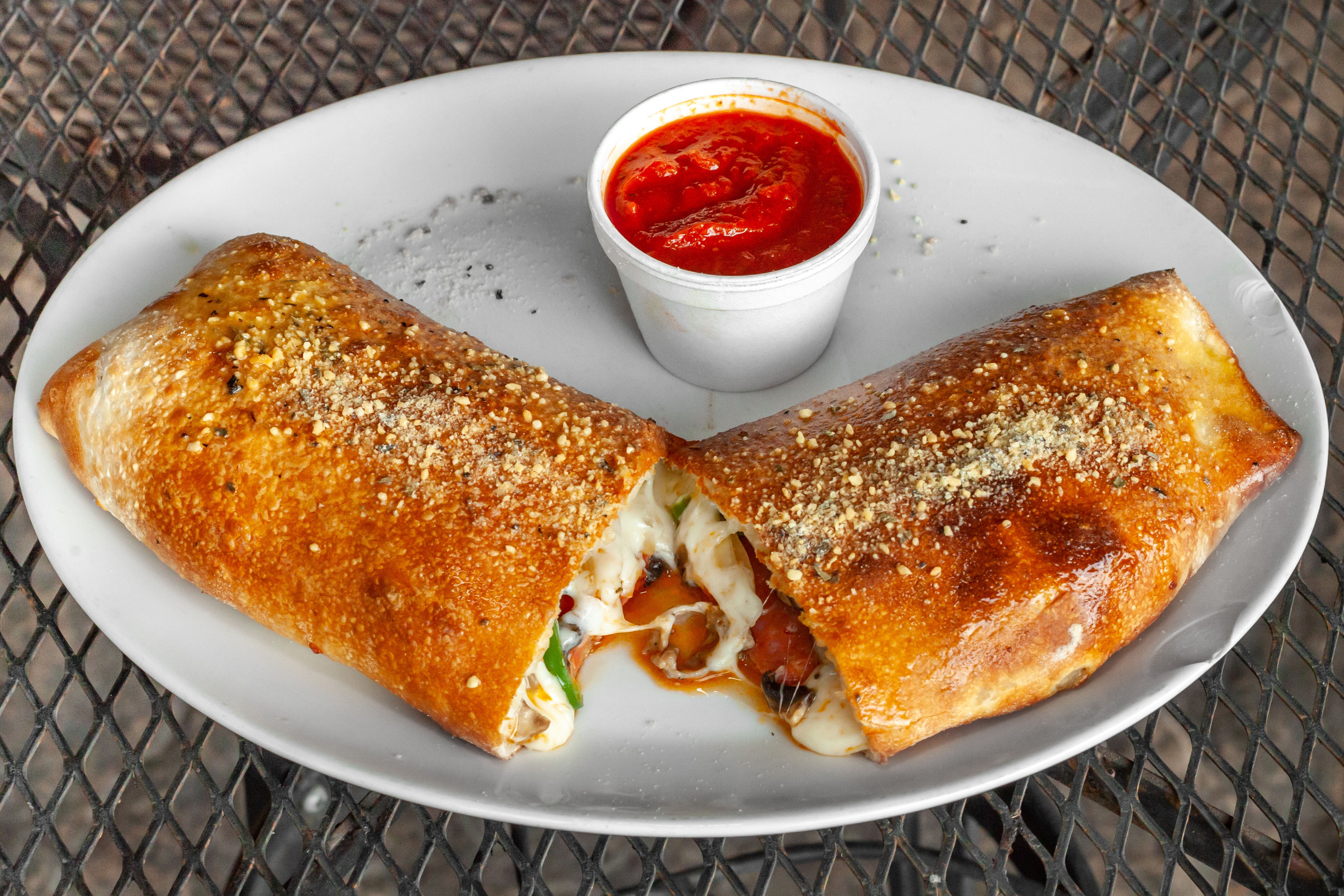 Order Stromboli - Small food online from Italian Delight of Powhatan store, Powhatan on bringmethat.com