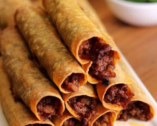 Order Beef & Cheese Taquitos food online from FFK Quick Eats store, Lilburn on bringmethat.com