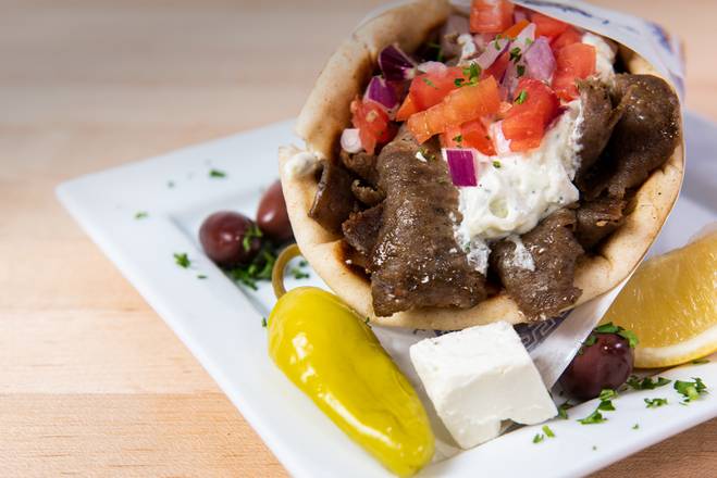 Order Our Famous Gyro Pita Sandwich food online from The Big Greek Cafe store, Silver Spring on bringmethat.com