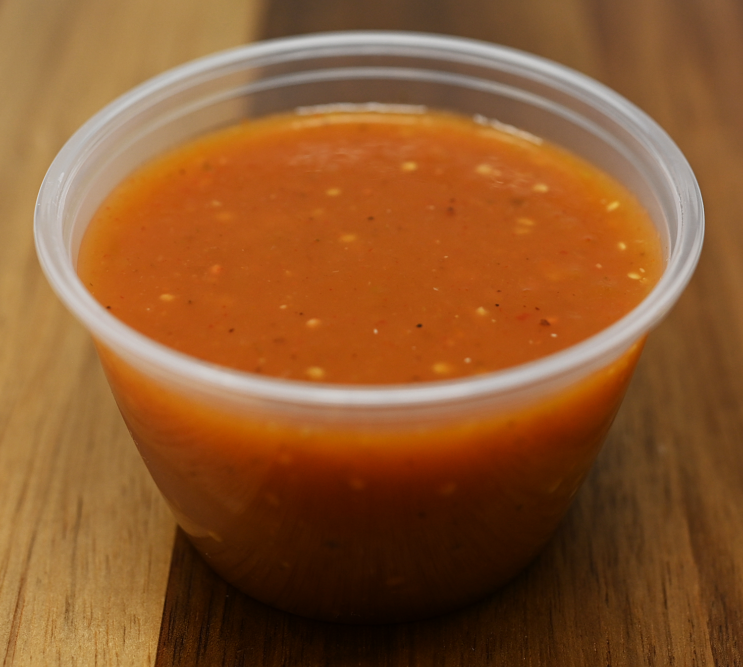 Order Side of Red Sauce 2 oz (Hot) food online from Mixteco Mexican Grill store, Chicago on bringmethat.com