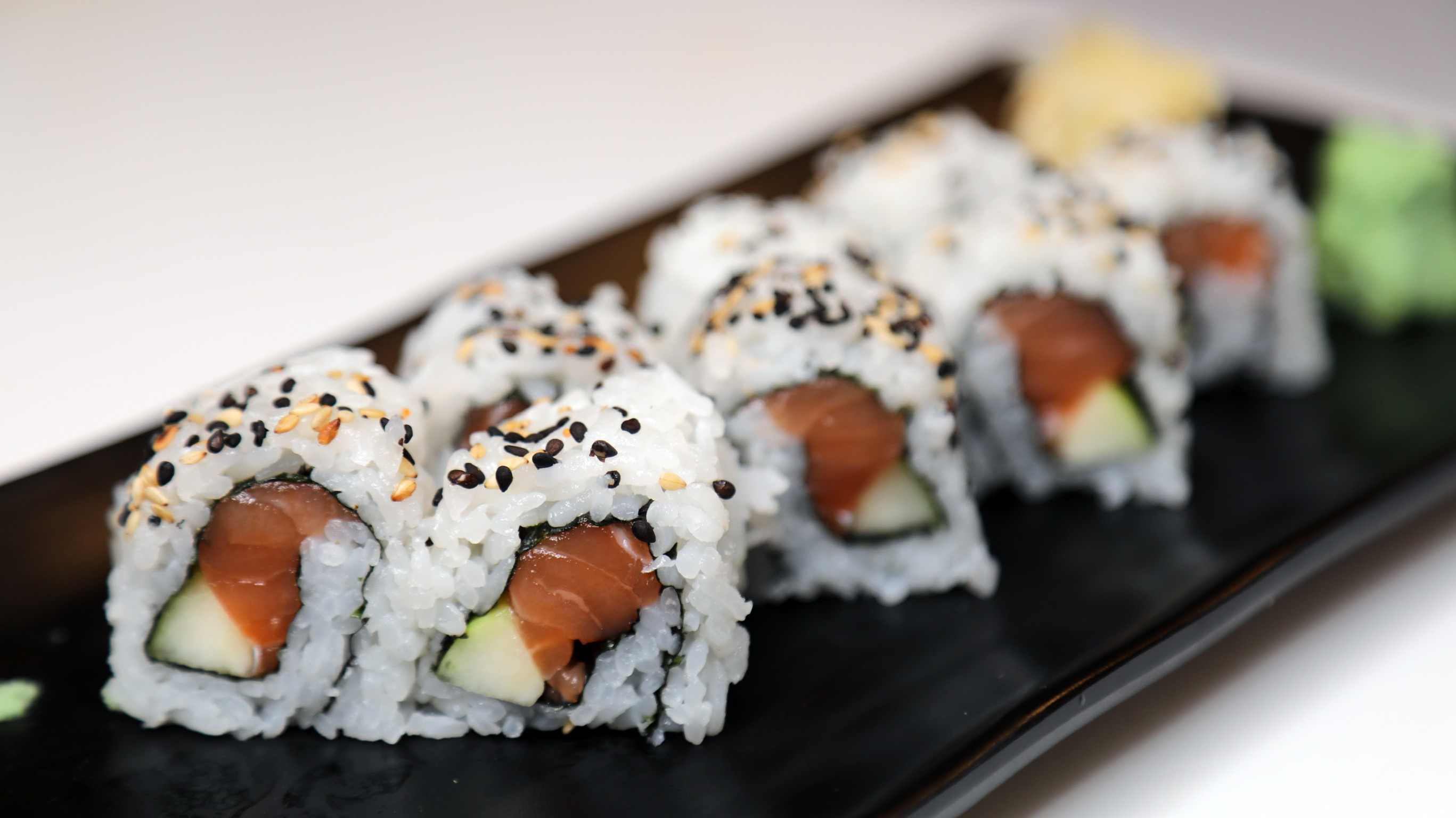 Order SPICY SALMON ROLL (sesame seed optional) food online from Sushi Koo store, Los Angeles on bringmethat.com